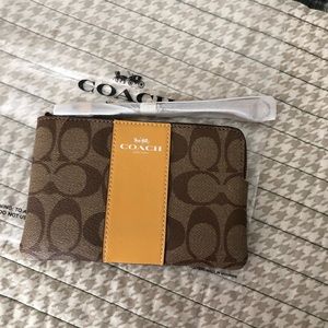 Coach signature print wristlet w/yellow stripe NWT